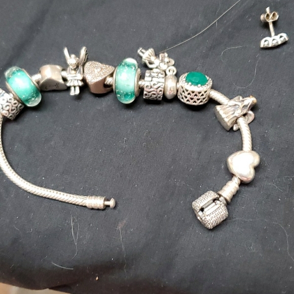 Pandora bracelet with Authentic charms some charm